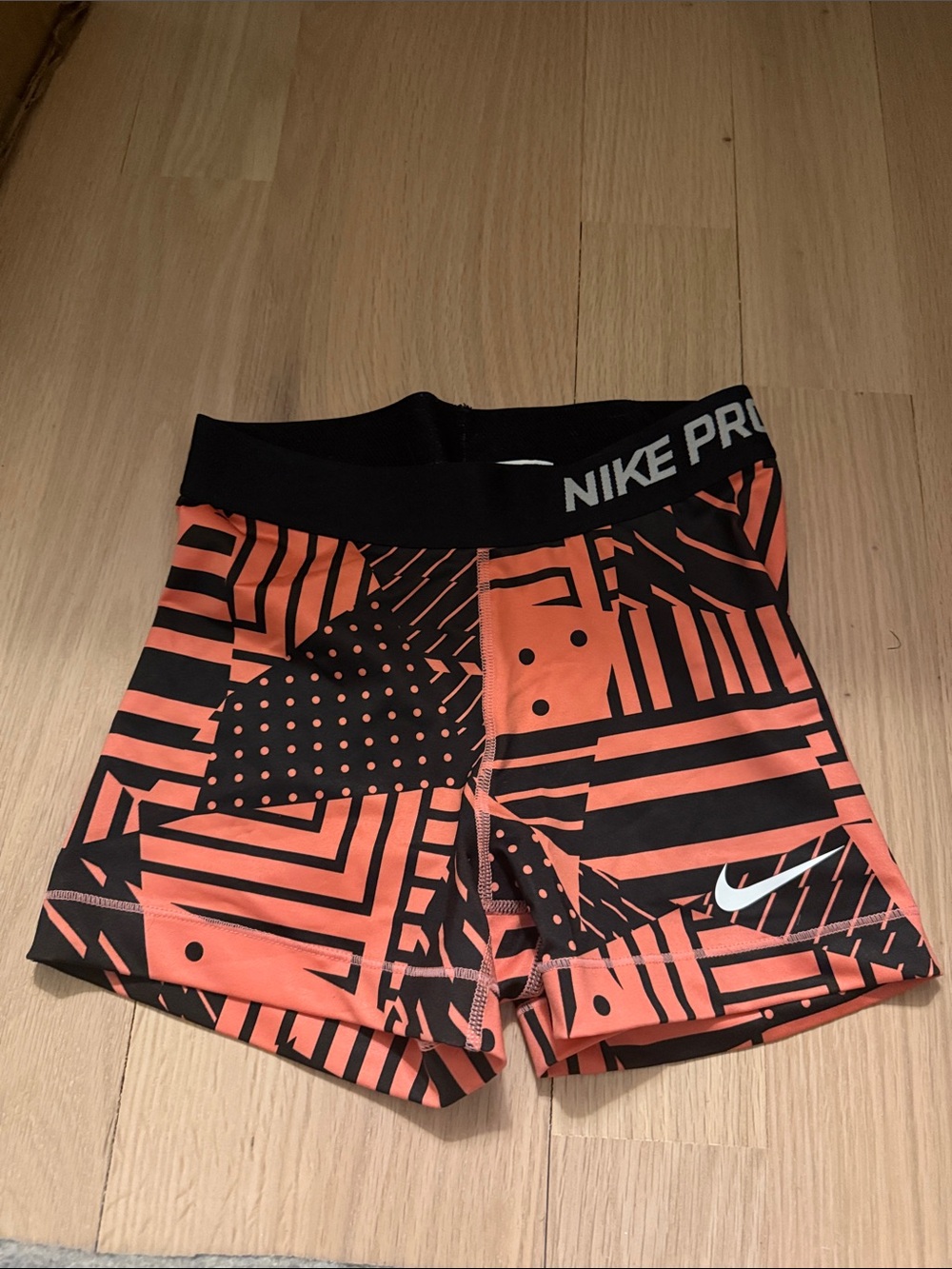 Nike Pro Women's Orange and Black Geometric Athletic Shorts
